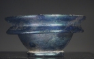 Early Roman blue glass small cosmetic bowl.