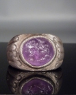 Roman silver ring with amethyst intaglio.