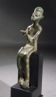 Canaanite bronze seated goddess.