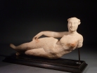 Parthian alabaster reclining figurine of a woman, possibly Aphrodite.
