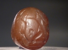 Chalcedon seal with a hunting king.