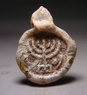 Jewish Menorah glass amulet.