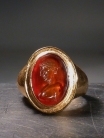 Roman athlete bust Carnelian intaglio. Set in modern 18K gold ring.